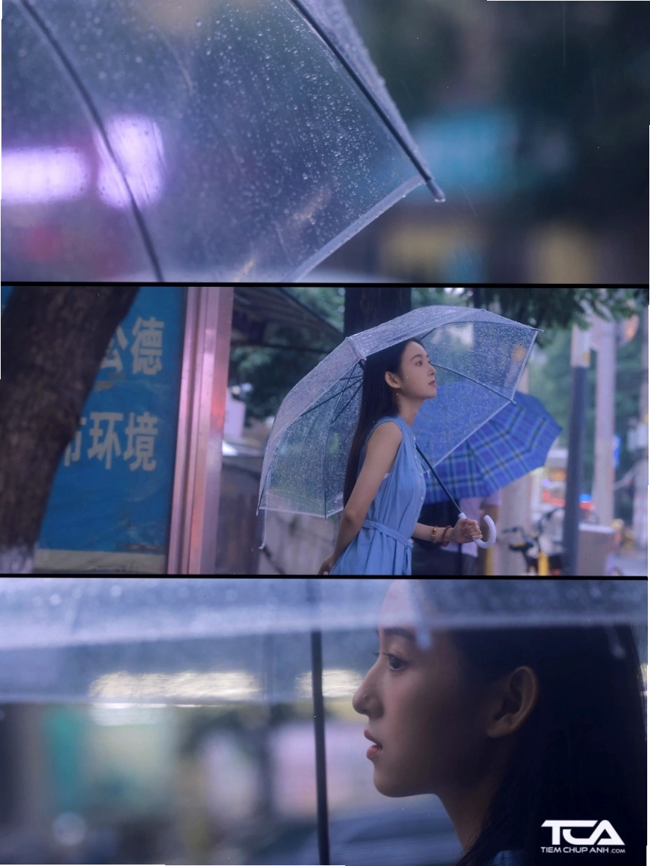 Hình ảnh cô gái đứng dưới mưa buồn và suy tư